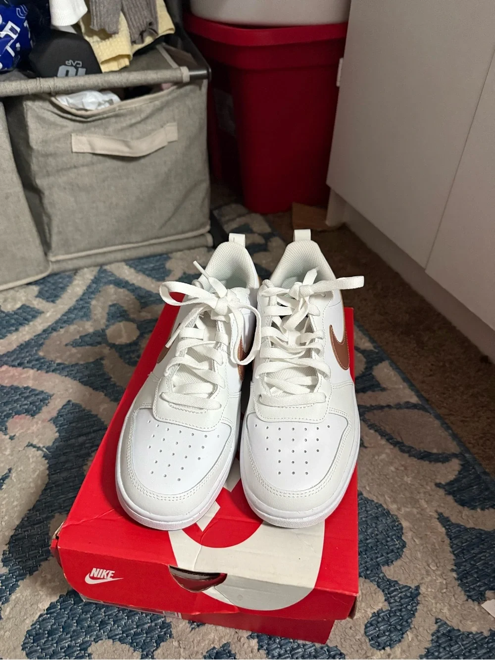 Nike Kids White Sneakers with Metallic Rose Swoosh
